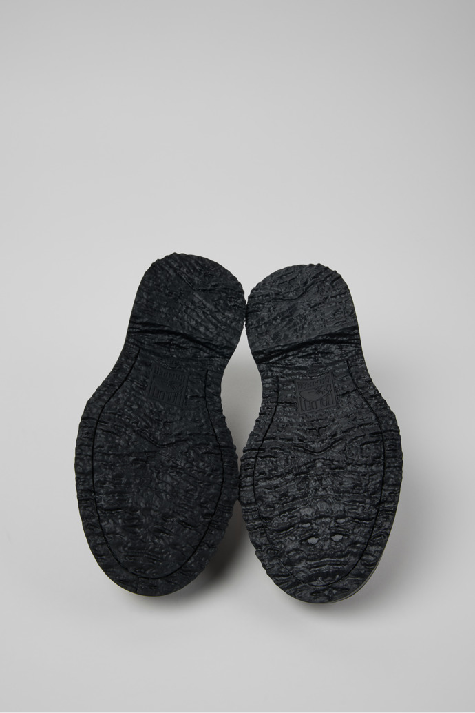 The soles of Walden Brown Leather Moccasins for Women.