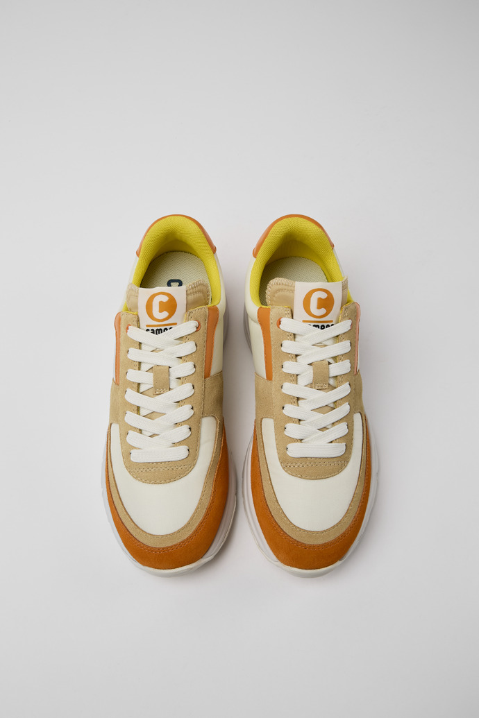 Overhead view of Drift White, beige, and orange nubuck sneakers for women
