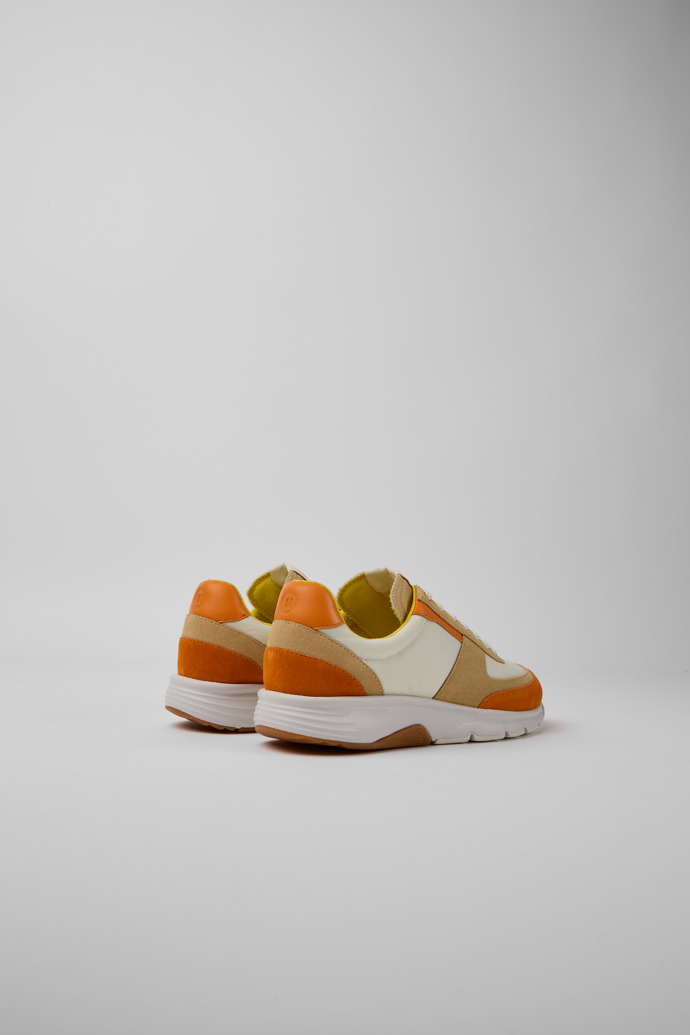 Back view of Drift White, beige, and orange nubuck sneakers for women