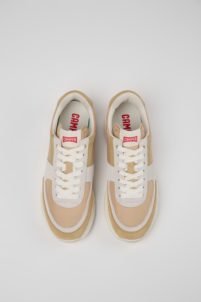 Overhead view of Drift Beige, white, and brown sneakers for women
