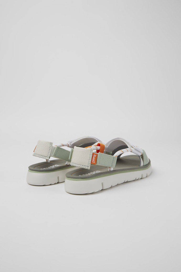 Back view of Oruga White, green, and orange sandals for women