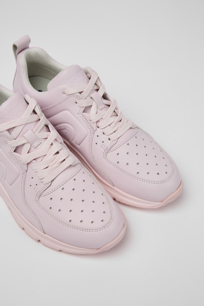 Close-up view of Drift Pink leather sneakers for women