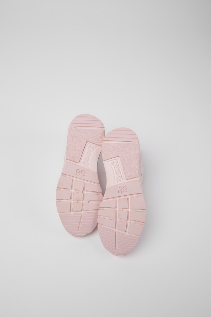 The soles of Drift Pink leather sneakers for women