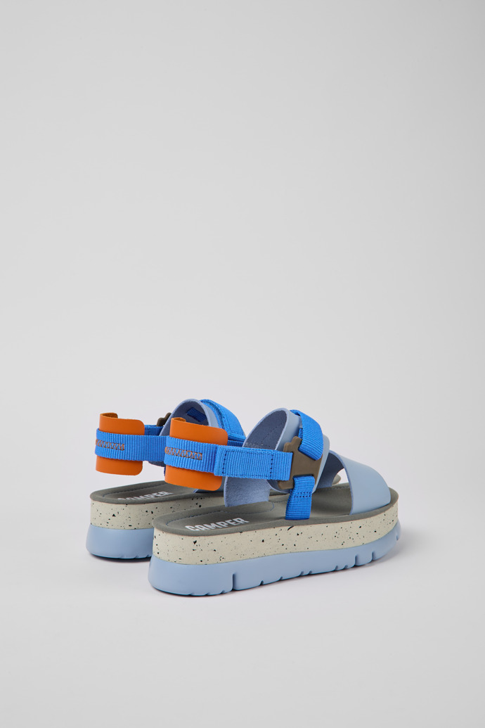 Back view of Oruga Up Blue and orange leather sandals for women