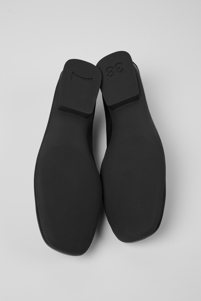 The soles of Casi Myra Black ballerinas for women