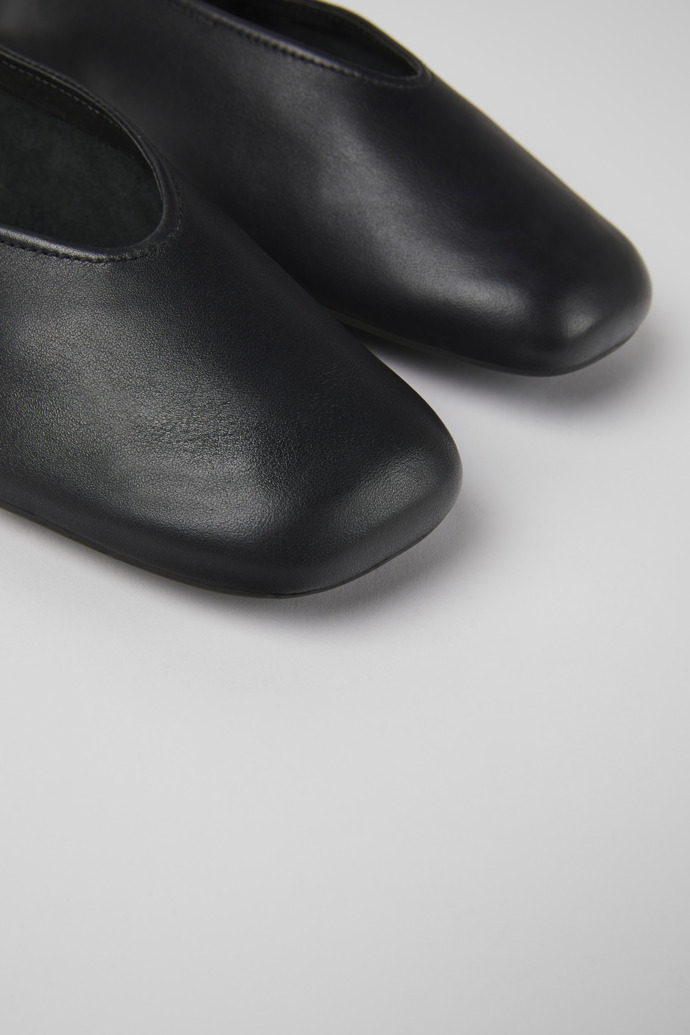 Close-up view of Casi Myra Black leather ballerinas for women