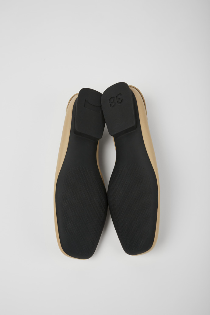 The soles of Casi Myra Beige leather ballerinas for women