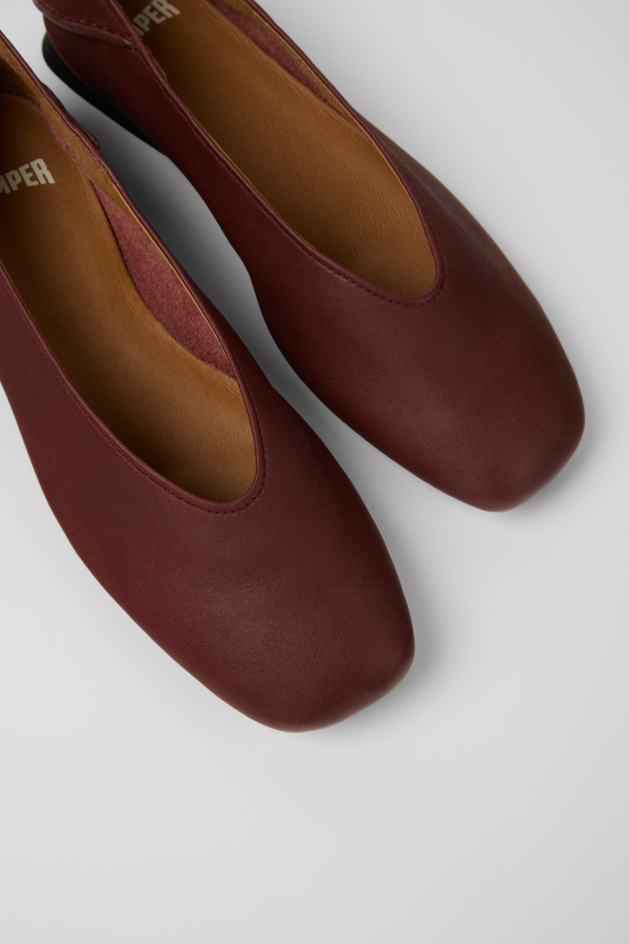 Close-up view of Casi Myra Burgundy Leather Ballerinas for Women.