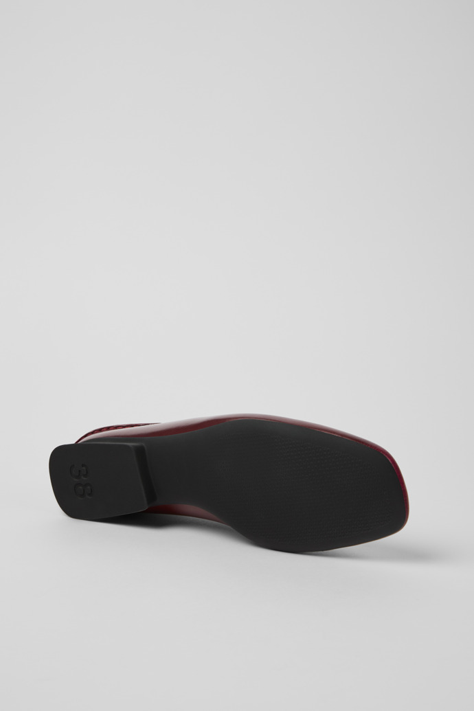 The soles of Casi Myra Burgundy Leather Ballerinas for Women.