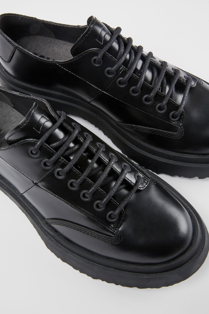 Close-up view of Walden Black leather lace-up shoes