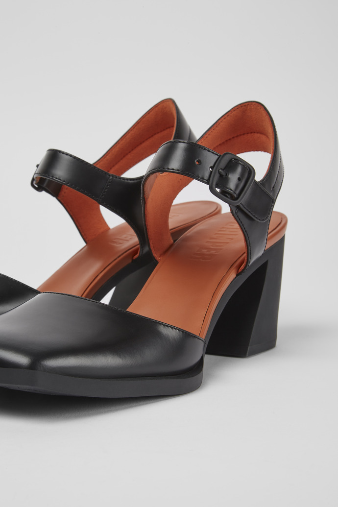 Close-up view of Karole Black leather semi-open shoes