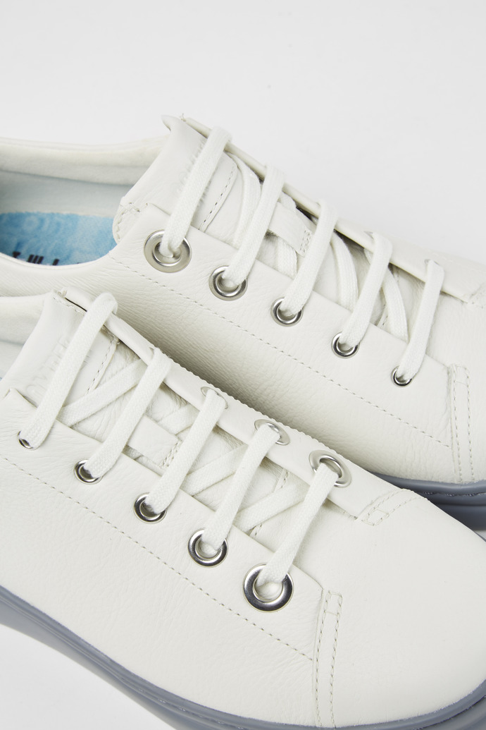 Close-up view of Twins White leather sneakers