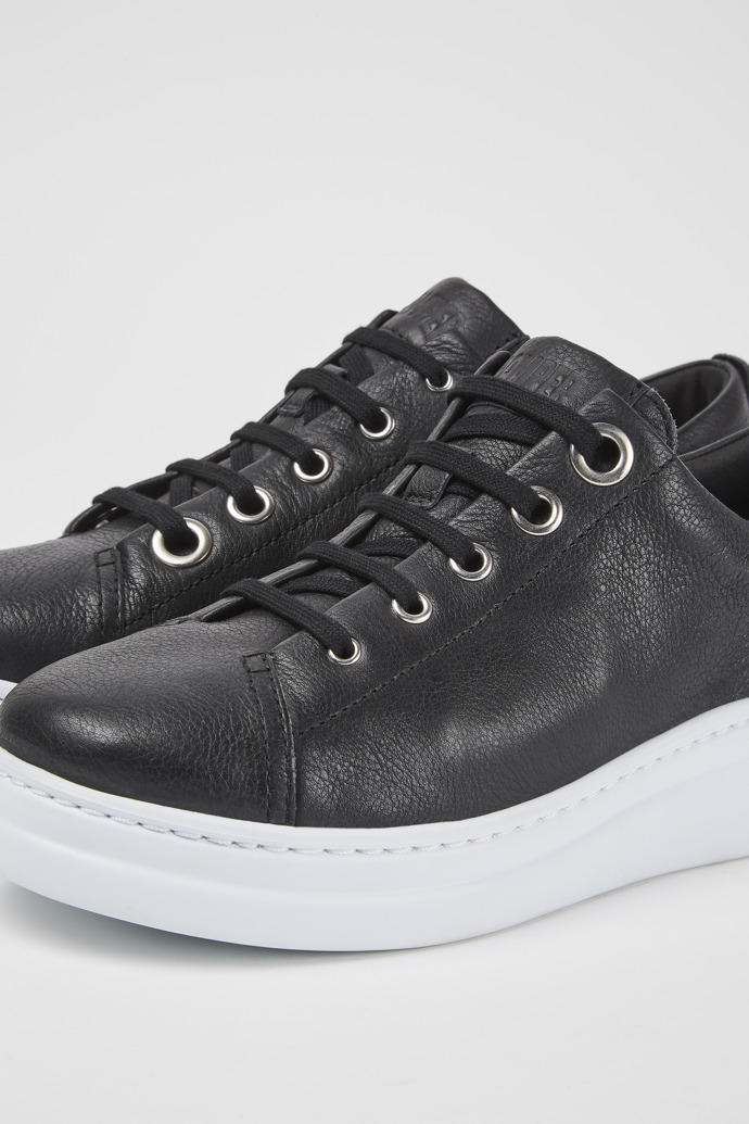 Close-up view of Twins Black leather sneakers