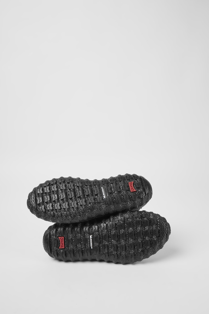 The soles of Ground Black and grey recycled textile shoes