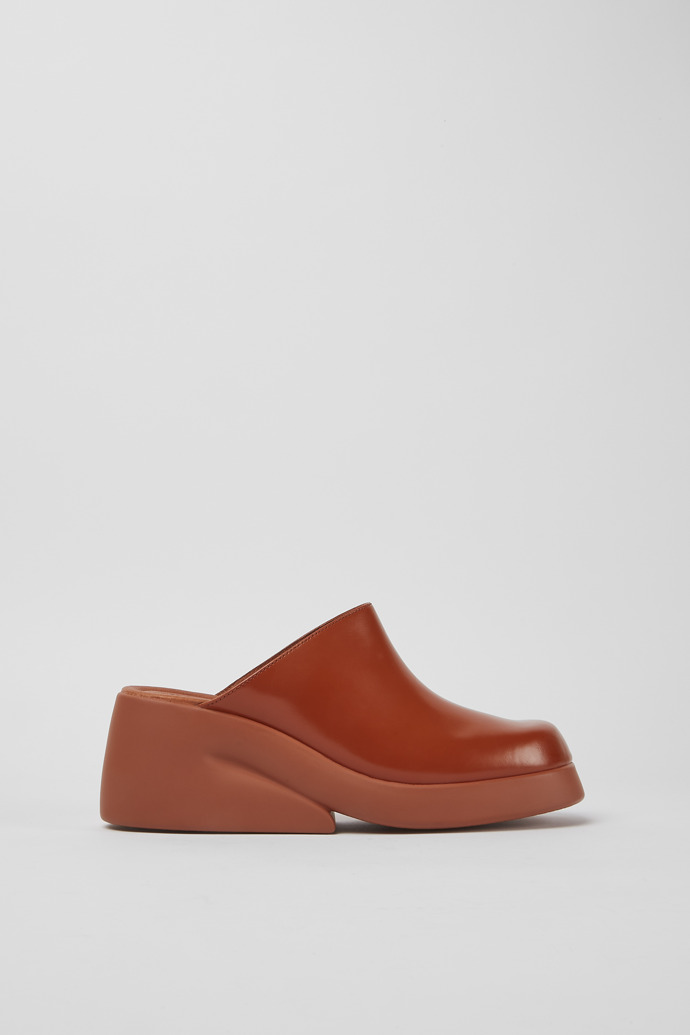 Side view of Kaah Brown leather clogs