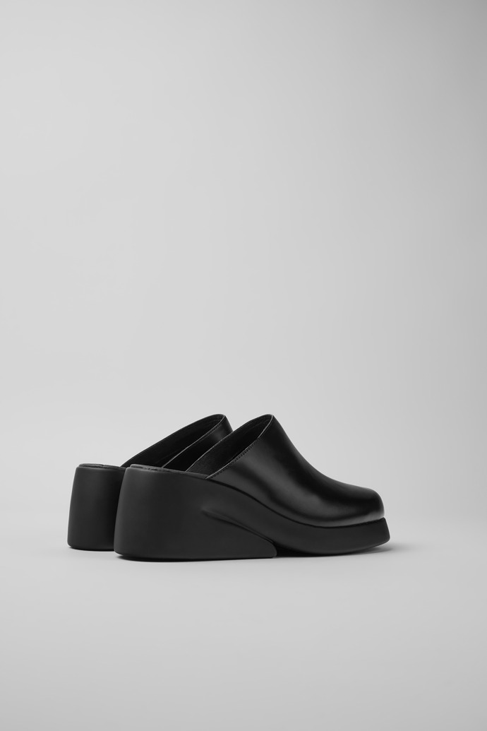Back view of Kaah Black leather clogs