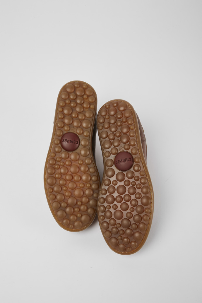 The soles of Twins Brown leather shoes for women