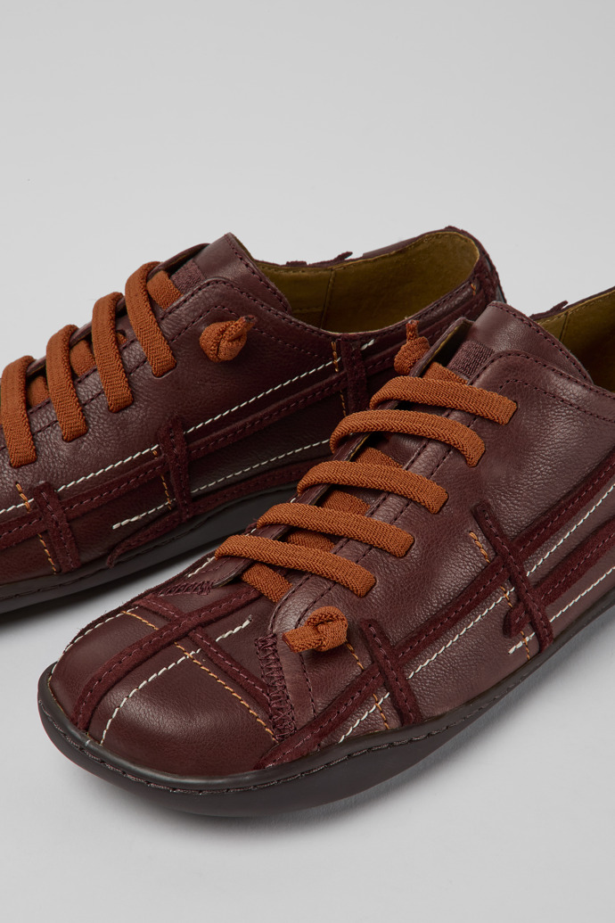 Close-up view of Twins Burgundy leather shoes for women