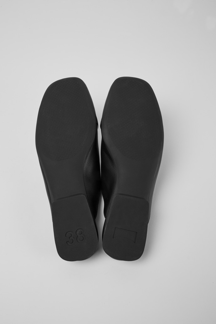 The soles of Casi Myra Black slip on leather shoes