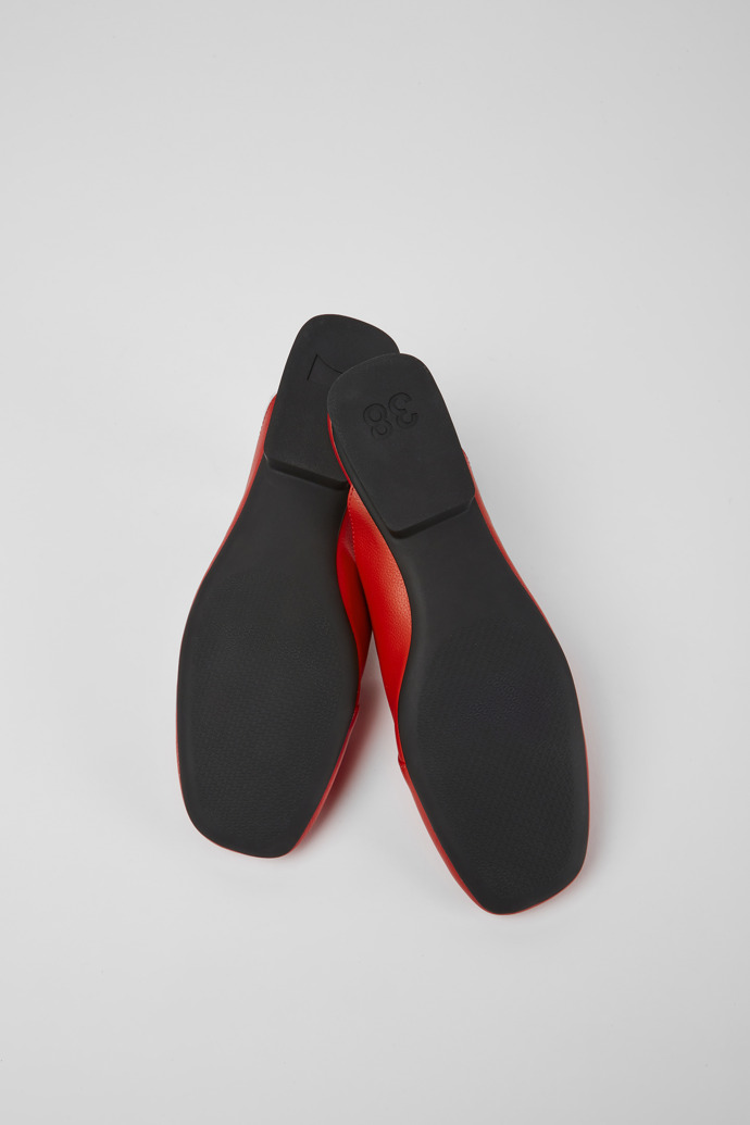 The soles of Casi Myra Red slip on leather shoes