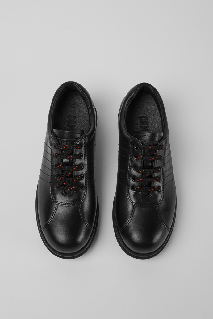 Overhead view of Pelotas Protect Black leather sneakers for women
