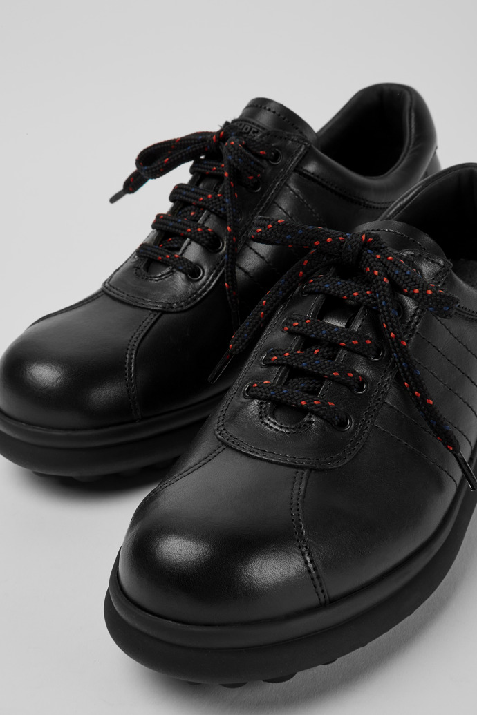 Close-up view of Pelotas Protect Black leather sneakers for women