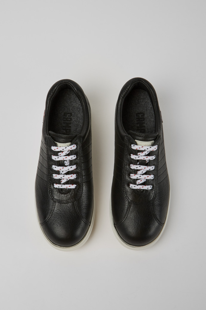 Overhead view of Pelotas Protect Black leather sneakers for women