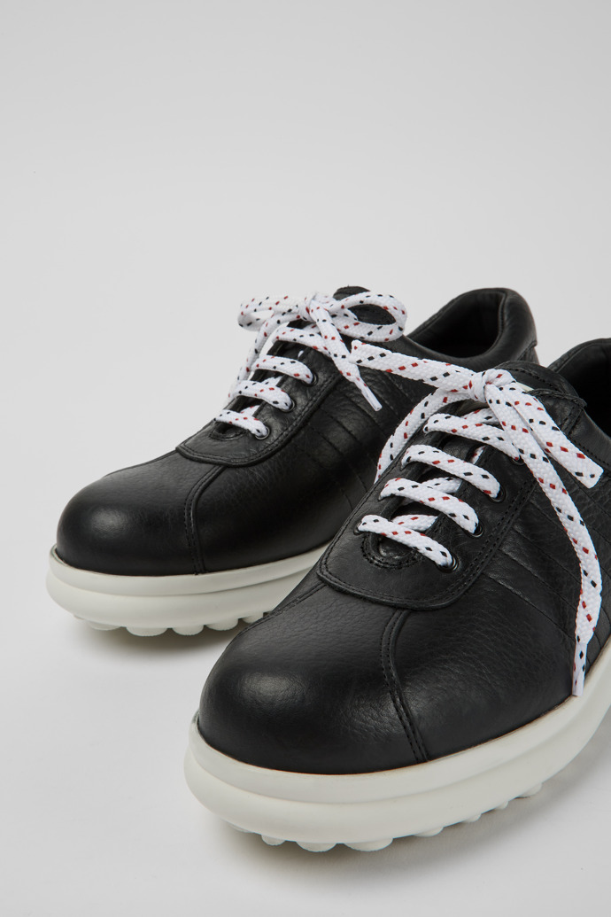 Close-up view of Pelotas Protect Black leather sneakers for women