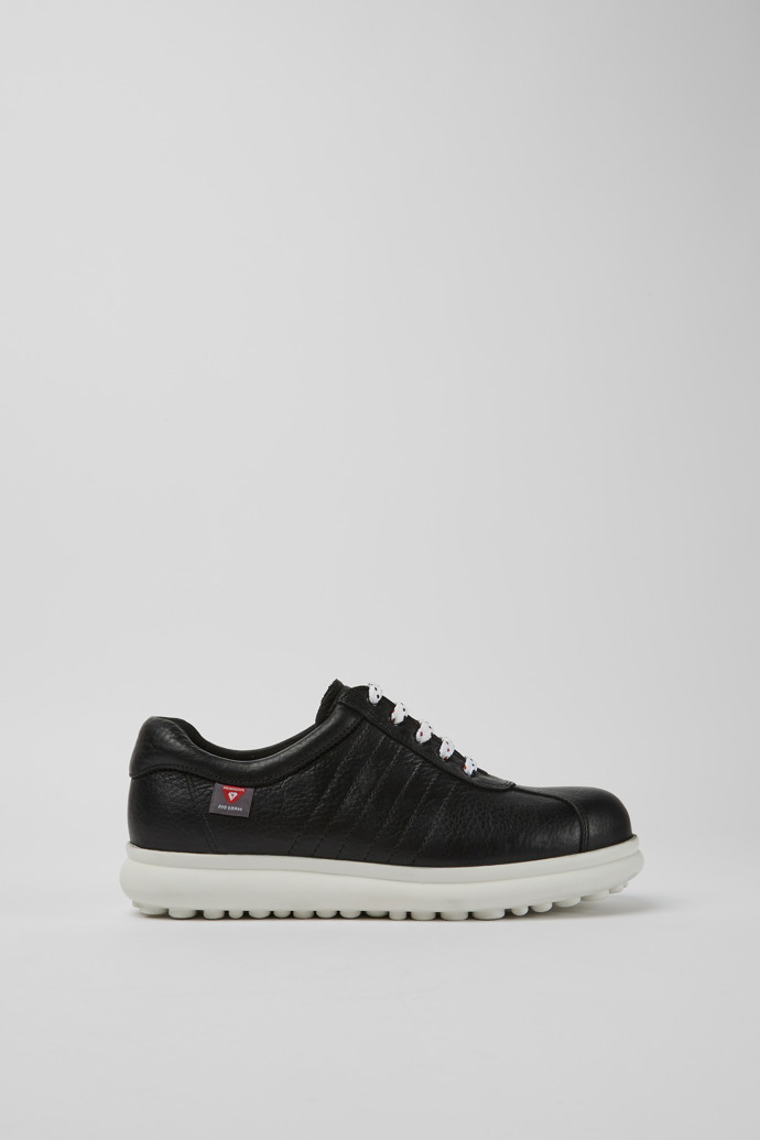 Side view of Pelotas Protect Black leather sneakers for women