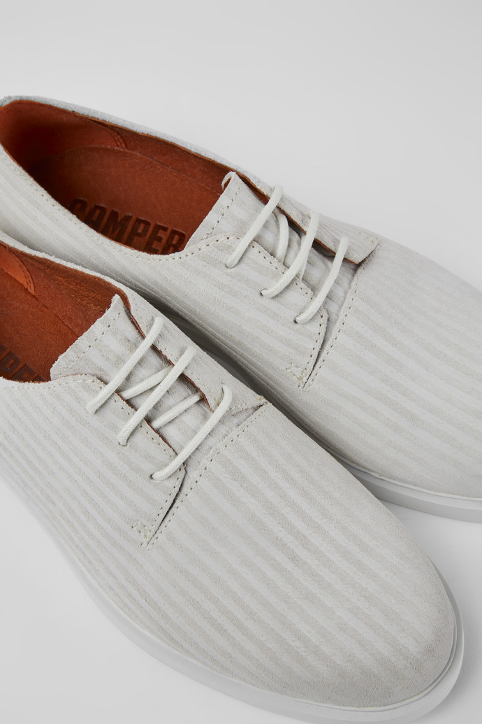Close-up view of Iman White nubuck shoes for women