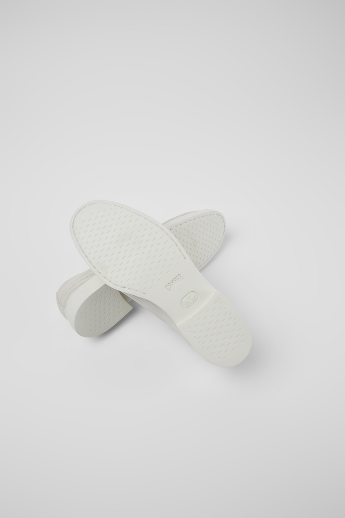 The soles of Iman White nubuck shoes for women