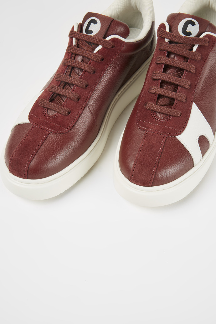 Close-up view of Runner K21 Burgundy sneakers for women