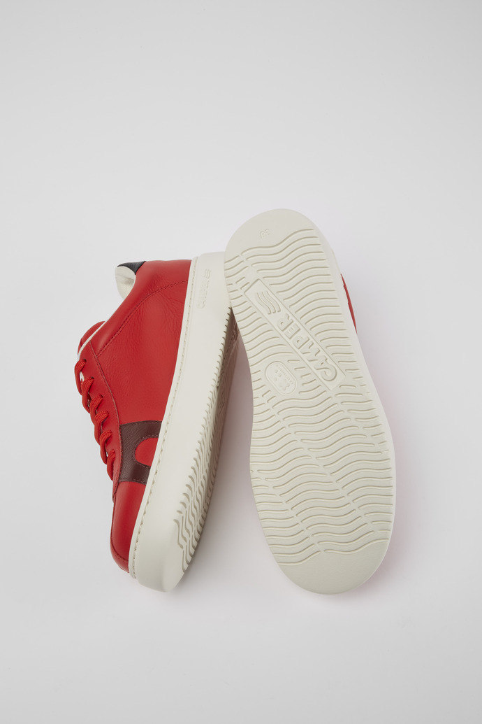 The soles of Twins Red leather sneakers