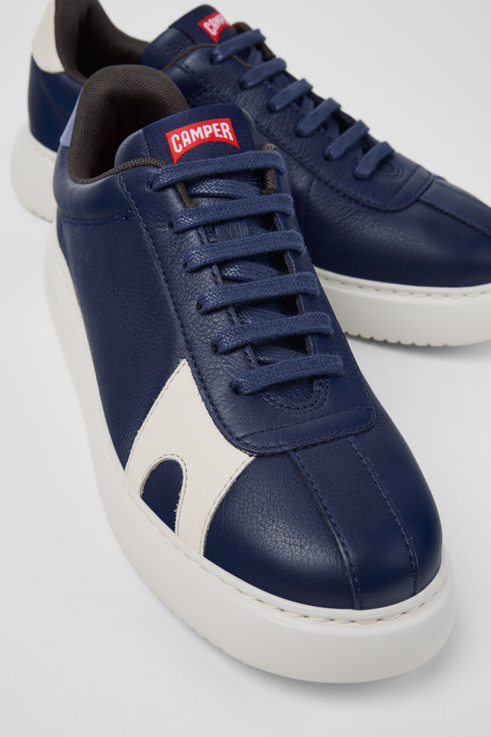 Close-up view of Twins Blue and White Leather Sneakers for Women.