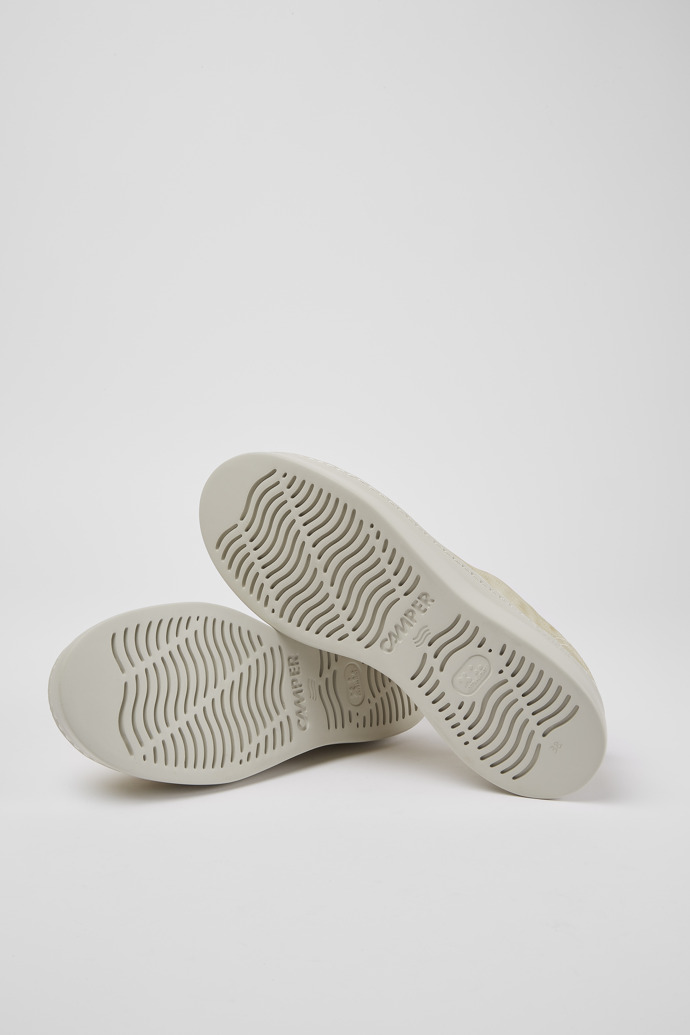 The soles of Twins Beige printed sneakers