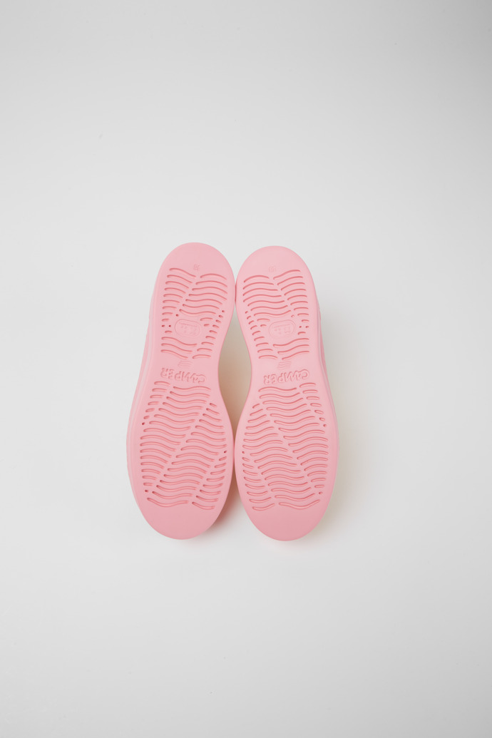 The soles of Runner Up Yellow and pink recycled cotton sneakers for women