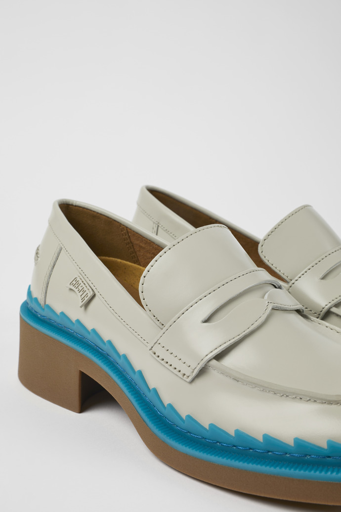 Close-up view of Taylor Gray and blue leather loafers for women