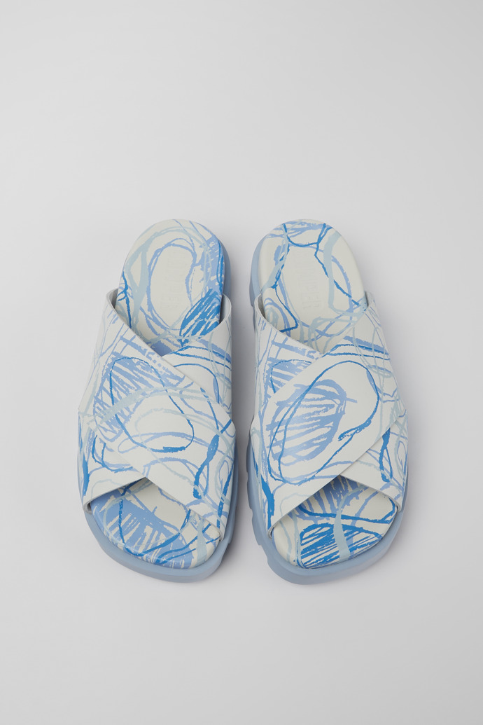 Overhead view of Brutus Sandal White and blue printed leather sandals for women