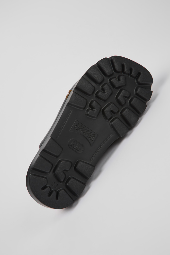 The soles of Brutus Sandal Black Leather Cross-strap Sandal for Women