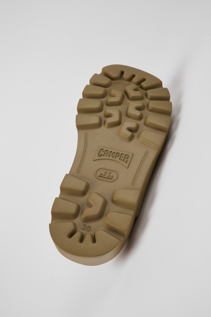 The soles of Brutus Sandal Brown Nubuck Cross-strap Sandal for Women
