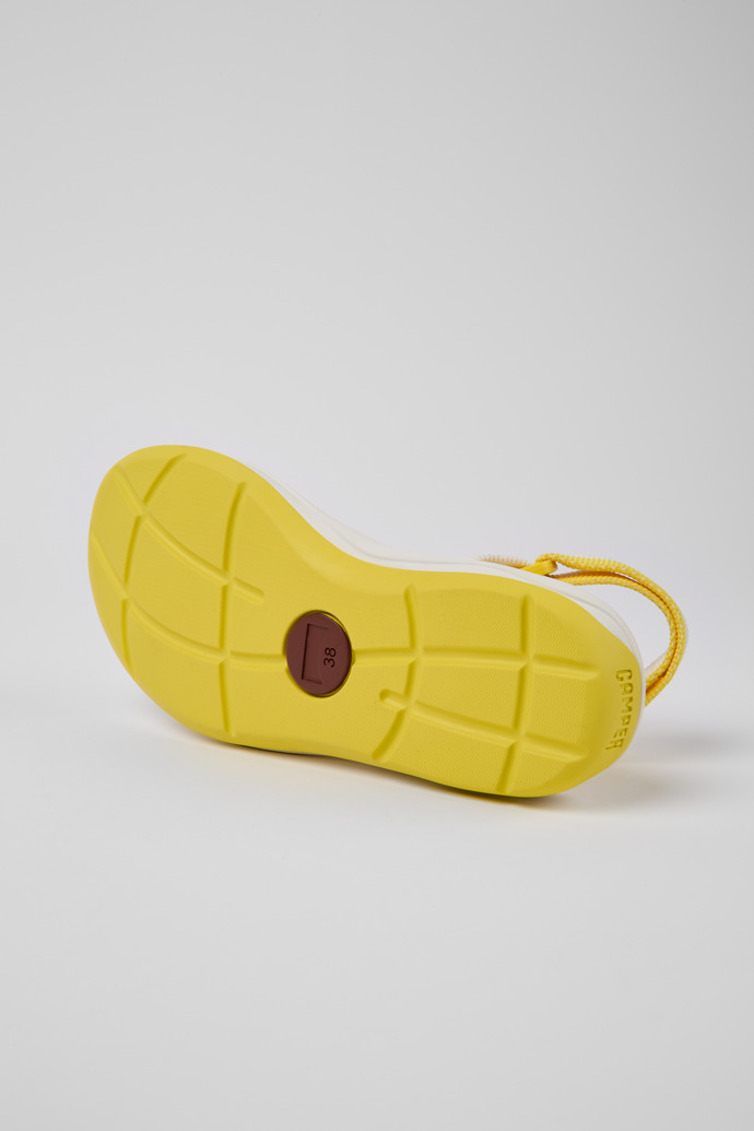 The soles of Match White and yellow recycled PET sandals for women