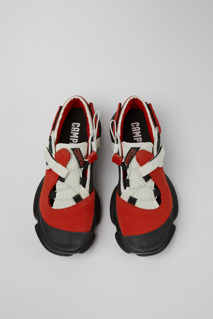 Overhead view of Karst White, black, and red textile shoes for women
