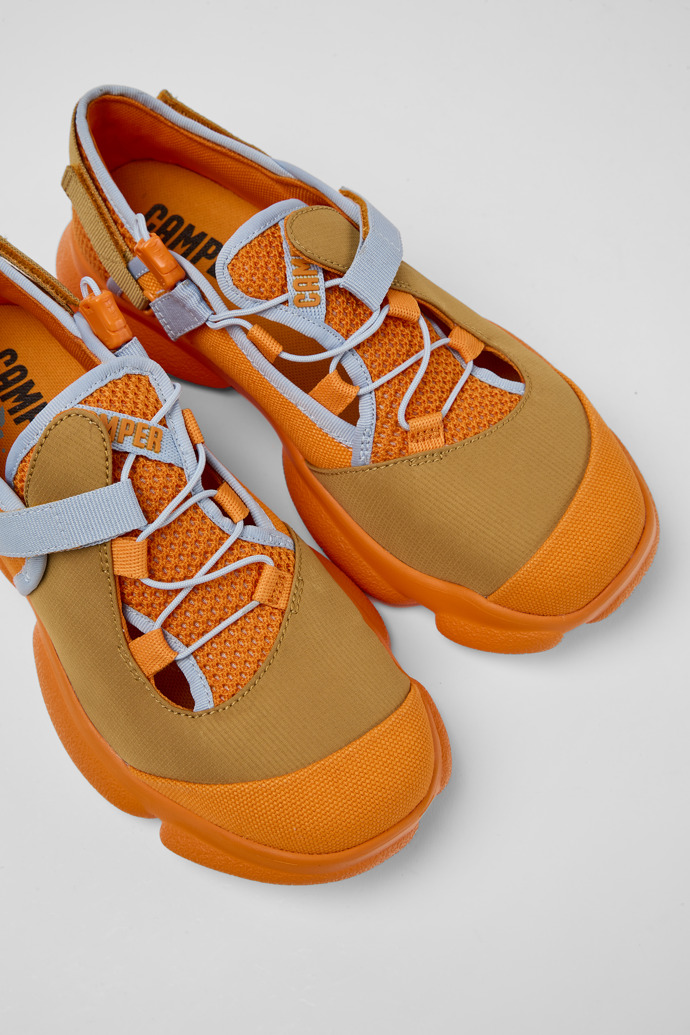 Close-up view of Karst Orange and brown textile shoes for women