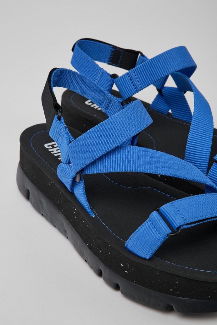 Close-up view of Oruga Up Blue recycled PET sandals for women