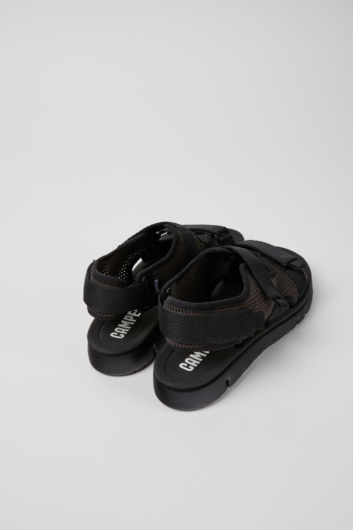 Back view of Oruga Black and grey sandals for women