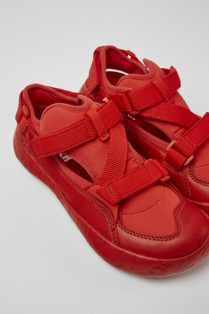 Close-up view of Peu Stadium Red semi-open sneakers for women