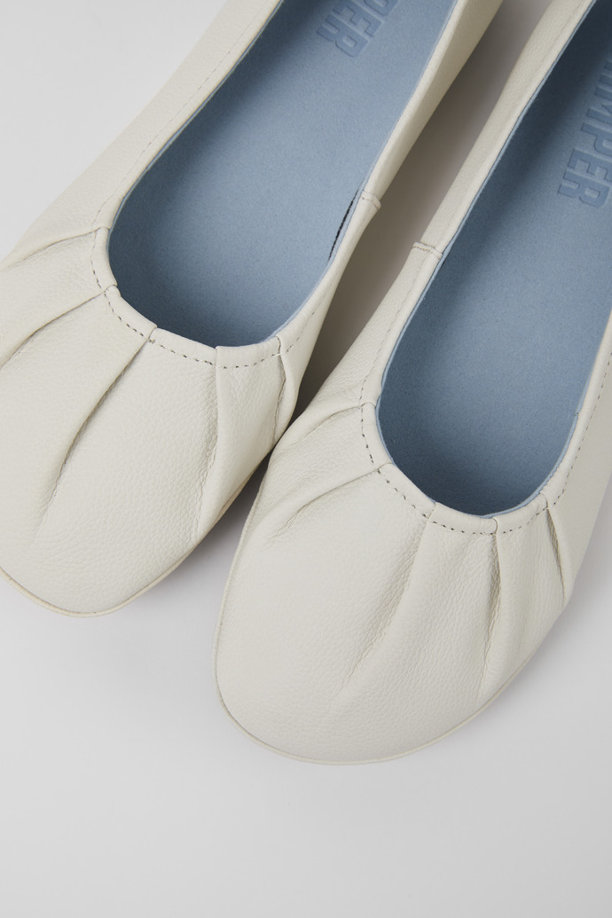 Close-up view of Right White leather shoes for women