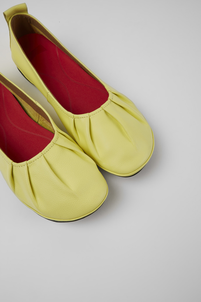 Close-up view of Right Yellow leather ballerina flats for women