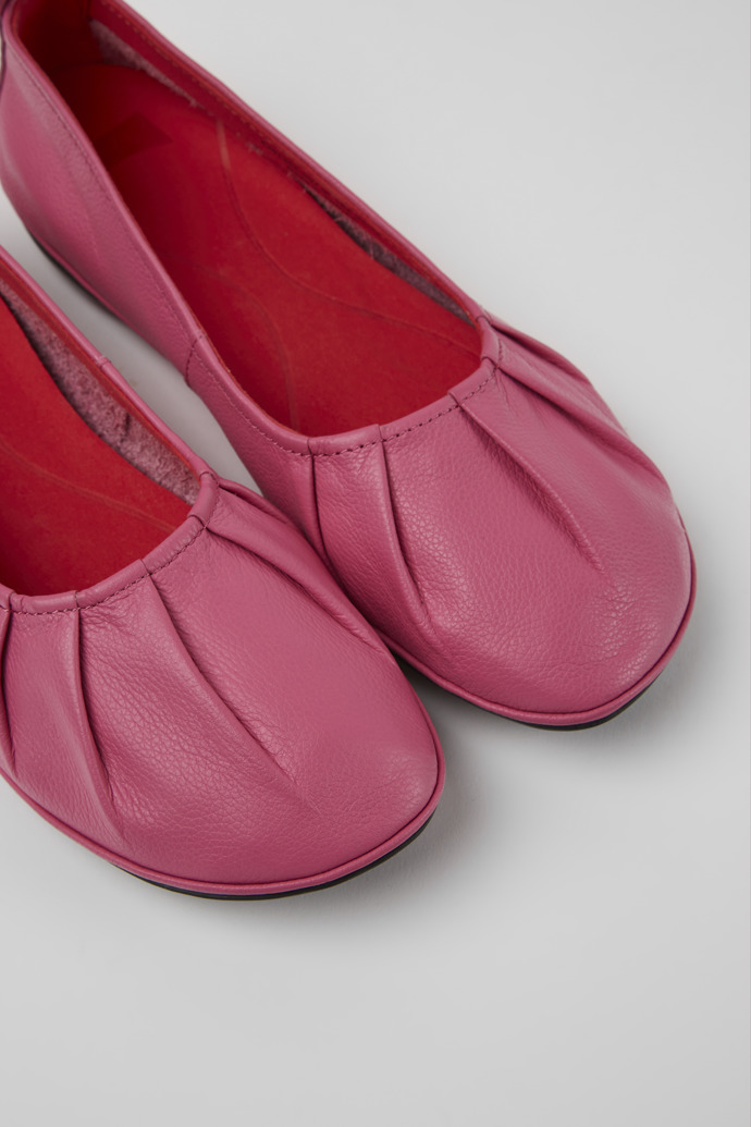 Close-up view of Right Pink leather ballerina flats for women
