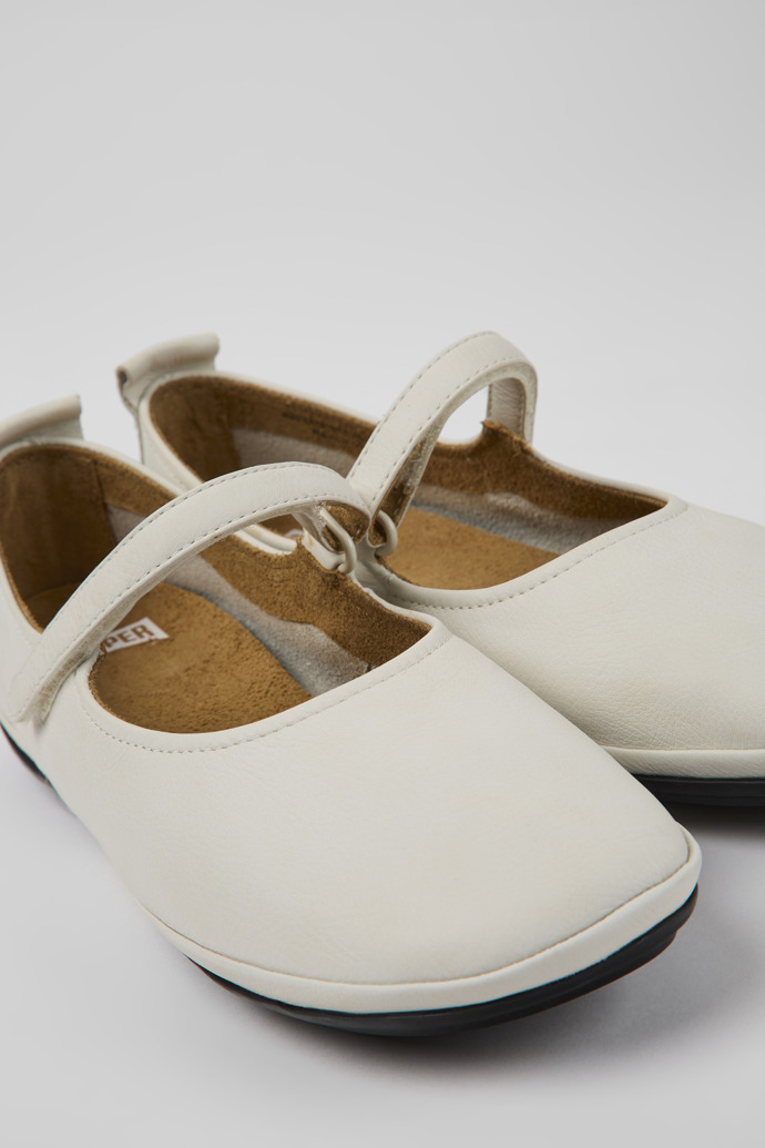 Close-up view of Right White leather ballerinas for women